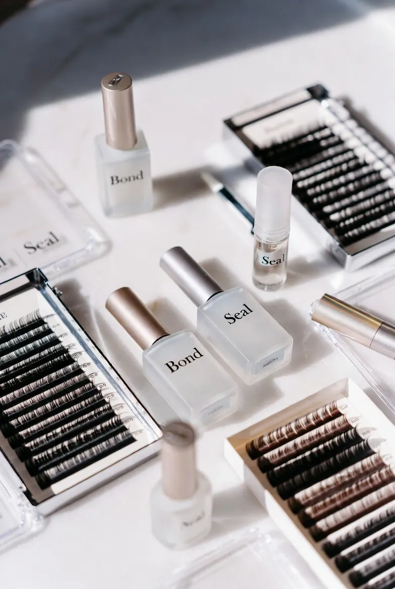 Bond and seal adhesive system for making lash clusters last longer